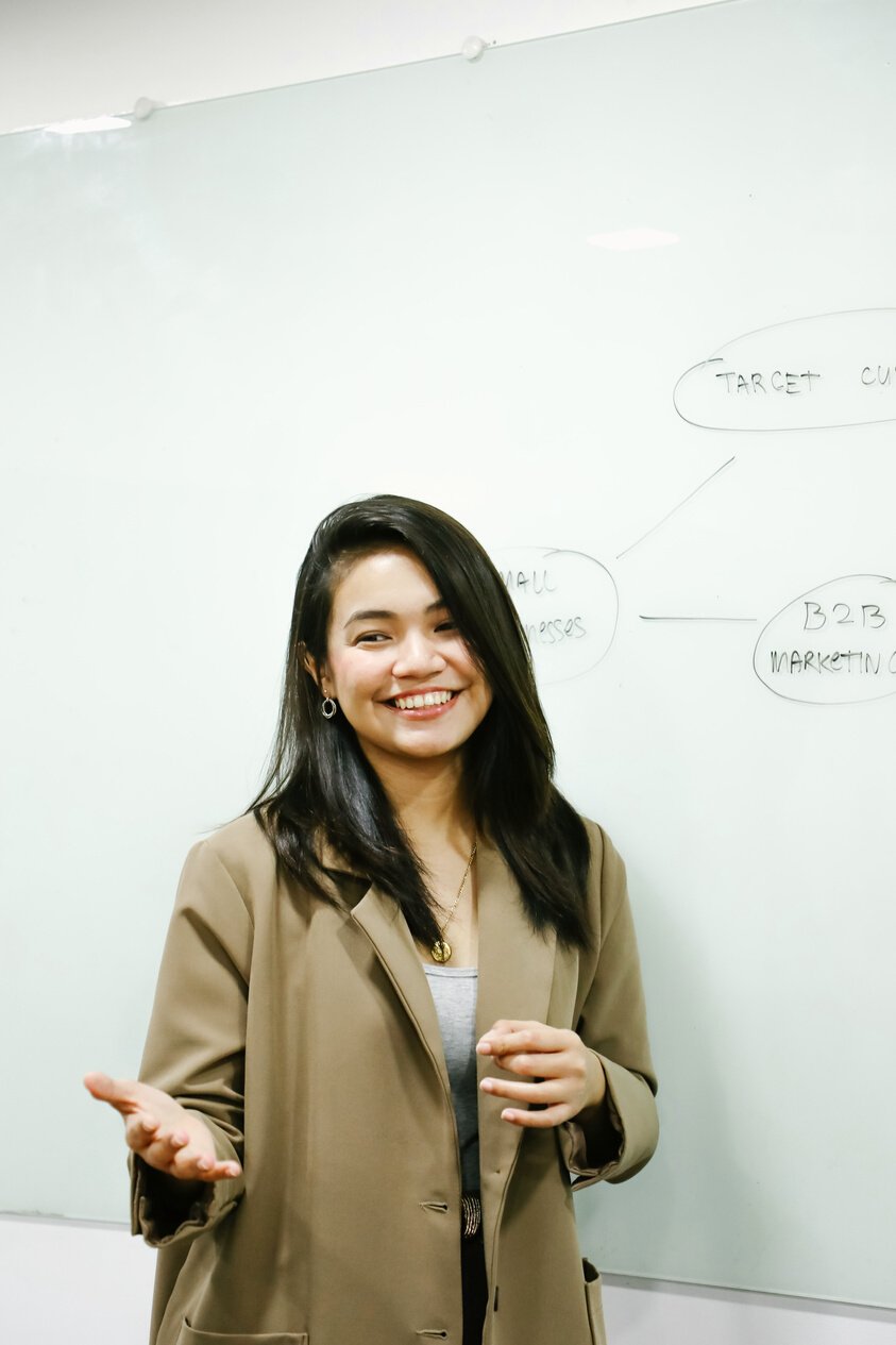 Woman presenting in a meeting